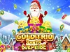Gold Trio Santa Surprise logo